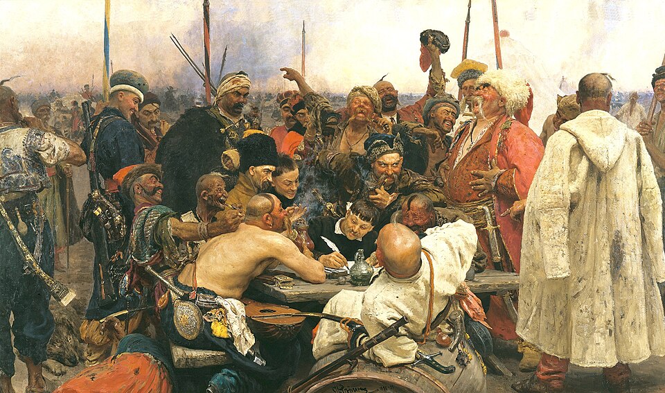 Репин Запорожцы: казаки вокруг стола смеются, один мужчина записывает письмо